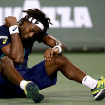 INDIAN WELLS, CA - MARCH 17:  Gael Monfils of France inspects himself after diving to the court while playing Milos Roanic of Canada during the BNP Paribas Open at the Indian Wells Tennis Garden on March 17, 2016 in Indian Wells, California.  (Photo by Matthew Stockman/Getty Images)